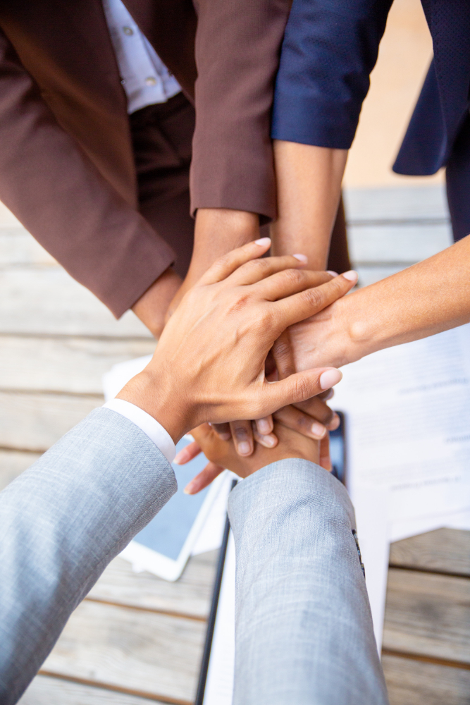 //www.darshrecruitment.com/wp-content/uploads/2024/01/successful-business-team-expressing-unity.jpg